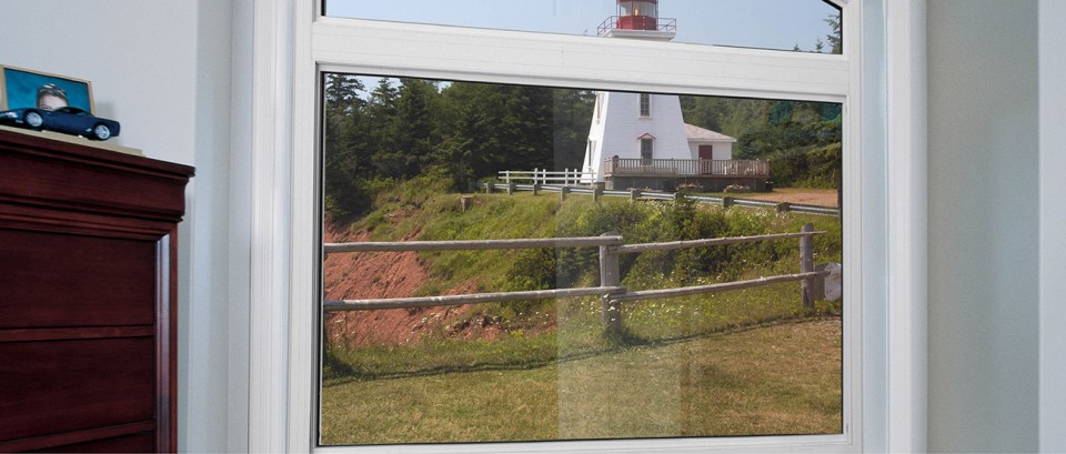 Apex 900 window overlooking a country lighthouse